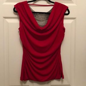 Beaded sleeveless cowl neck top.
